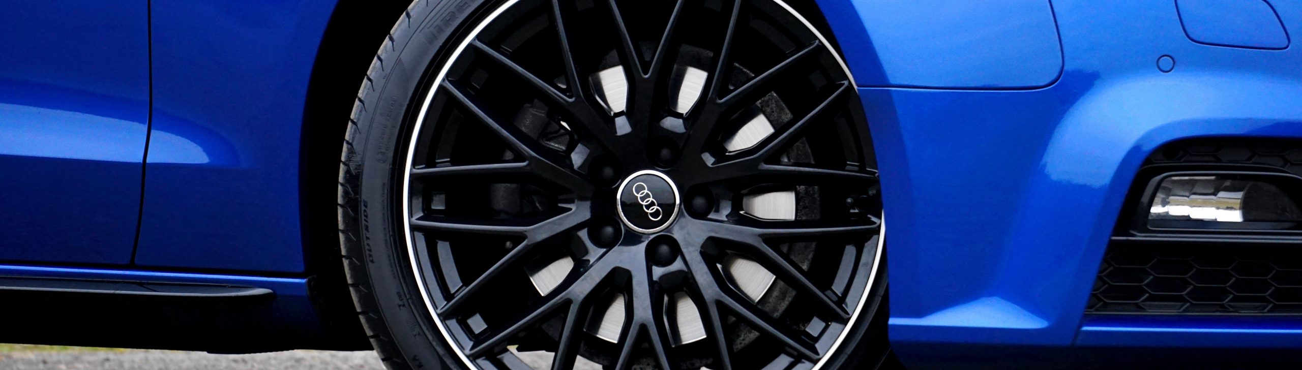 Close up of blue Audi car wheel