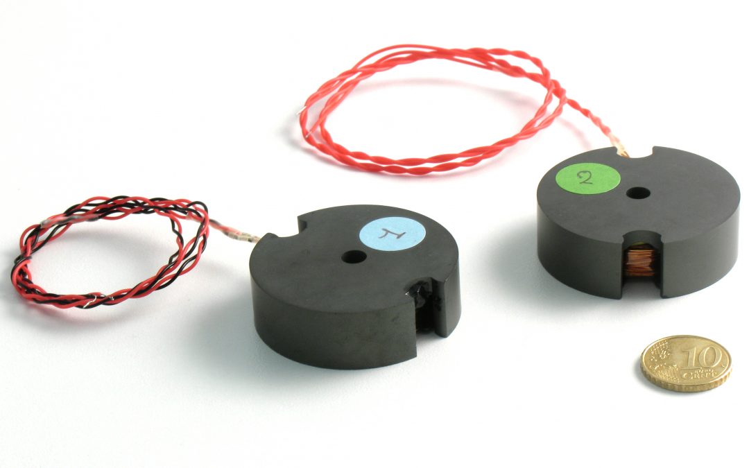 Contactless Magnetic Sensors for position measurement in the cm range